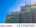 Urban landscape restoration work in Yokohama, Japan. Clear autumn weather… Large-scale exterior wall repair work at a community center = October 19th 143760383