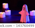 Halloween image featuring ghosts and candles (using colored lights) 143760499