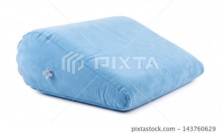 Blue Inflatable Wedge Pillow for Leg Elevation and Back Support Isolated on White Blue Inflatable Wedge Pillow for Leg Elevation and Back Support Isolated on White 143760629
