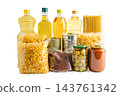 Foodstuff for donation, storage and delivery. Various food, pasta, cooking oil and canned food in cardboard box. 143761342