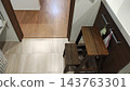A wooden step stool placed in the bathroom and a natural space 143763301