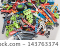 Colorful mechanical construction toy parts with wheels and connectors for STEM education 143763374