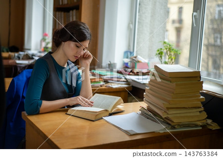 Portrait of female student in university library 143763384