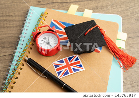 Time to learn English language, book with uk flag. Time to learn English language, book with uk flag. 143763917