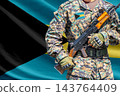 Bahamas flag with soldier holding assault rifle 143764409