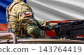 Chile flag with soldier at machinegun turret 143764419