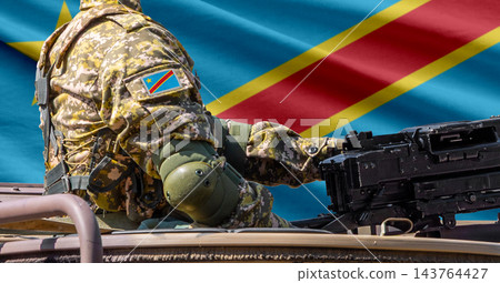 Democratic Republic of the Congo flag with soldier at machinegun turret Democratic Republic of the Congo flag with soldier at machinegun turret 143764427