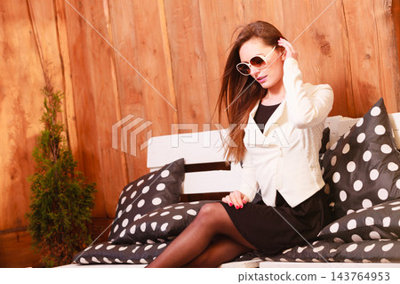 Young woman relax on bench. Young woman relax on bench. 143764953