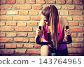 Active woman doing sport biking. 143764965