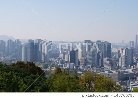 Famous N Seoul Tower landmark and urban skyline view from Namsan Mountain 143766793