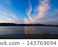 The sea around Miyajima and the mountains of the Seto Inland Sea, bathed in the colors of the sunset. 143769094