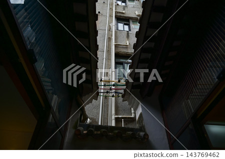 Close-up of the colorful electric wire at the rooftop of Chinese classic roof of traditional building, Chinese architecture in China. 143769462