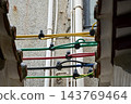 Close-up of the colorful electric wire at the rooftop of Chinese classic roof of traditional building, Chinese architecture in China. 143769464