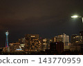 The illuminated Yokohama Marine Tower and the surrounding hotels and skyscrapers of Yamashita Park create a glittering night view. The illuminated Yokohama Marine Tower and the surrounding hotels and skyscrapers of Yamashita Park create a glittering night view. 143770959