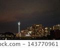 A night view of Yokohama Marine Tower and the cluster of high-rise buildings surrounding Hotel New Grand. A night view of Yokohama Marine Tower and the cluster of high-rise buildings surrounding Hotel New Grand. 143770961
