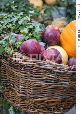 Autumn Harvest Still Life with Pumpkins and Apples. Farmer's market stand with fresh vegetables and fruits. Apples and pumpkin in bicycle basket. Healthy food background. October harvest. Fall harvest Autumn Harvest Still Life with Pumpkins and Apples. Farmer's market stand with fresh vegetables and fruits. Apples and pumpkin in bicycle basket. Healthy food background. October harvest. Fall harvest 143771221
