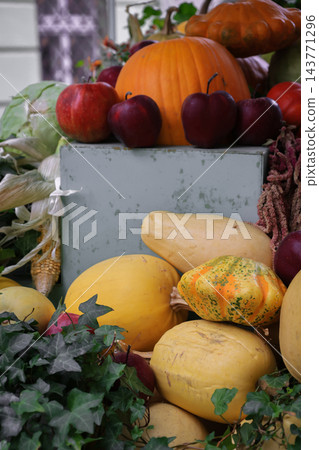 Autumn Harvest Still Life with Pumpkins, Apples and Squash. Farmer's market stand with fresh vegetables and fruits. Healthy food background. Pumpkin, apples, cabbage and squash in basket. Autumn Harvest Still Life with Pumpkins, Apples and Squash. Farmer's market stand with fresh vegetables and fruits. Healthy food background. Pumpkin, apples, cabbage and squash in basket. 143771296