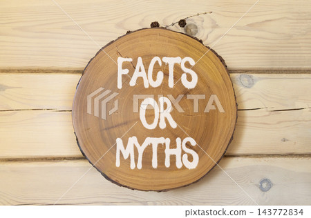Facts or myths words symbol. Concept words Myths or Facts on beautiful wooden circle. Beautiful wooden wall background. Business and facts or myths concept. Copy space. Facts or myths words symbol. Concept words Myths or Facts on beautiful wooden circle. Beautiful wooden wall background. Business and facts or myths concept. Copy space. 143772834