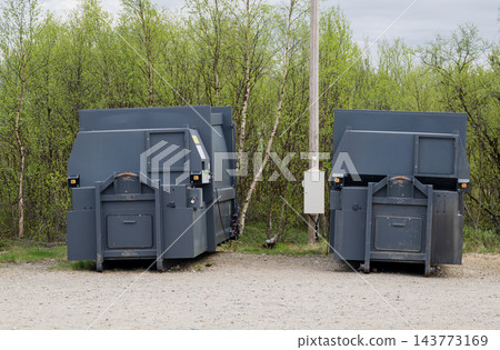 Waste sorting and recycling containers at remote collection point in Finnish Lapland Waste sorting and recycling containers at remote collection point in Finnish Lapland 143773169