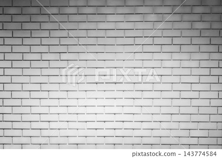 White brick wall with rectangular bricks arranged in staggered horizontal rows, narrow recessed joints and small surface marks across a repeating architectural pattern with slightly uneven edges. White brick wall with rectangular bricks arranged in staggered horizontal rows, narrow recessed joints and small surface marks across a repeating architectural pattern with slightly uneven edges. 143774584