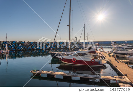 Boats at the dock in Imeretinsky Port, Sochi. Sirius. Krasnodar Krai, Russia. Boats at the dock in Imeretinsky Port, Sochi. Sirius. Krasnodar Krai, Russia. 143777059