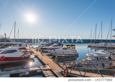 Boats at the dock in Imeretinsky Port, Sochi. Sirius. Krasnodar Krai, Russia. Boats at the dock in Imeretinsky Port, Sochi. Sirius. Krasnodar Krai, Russia. 143777060