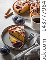 Homemade plum pie for breakfast and a cup of coffee 143777984