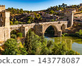 Medieval Puente de San Martin Bridge Over the Tagus in Toledo 143778087