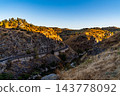Winding Road Through Rocky Gorge at Sunset in Toledo 143778092