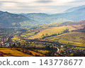 rural fields near Borzhava Mountains in autumn time landscape. beautiful view of agricultural area. gorgeous mountain ridge with rolling hills. cloudy sky 143778677