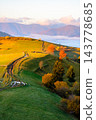 scenic carpathian morning in autumn. countryside mountain landscape with forest in fall colors. path leading through rolling hills in to the foggy valley under bright sky 143778685