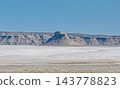The Karinjalik plateau visible beyond the white salt-covered ground. 143778823