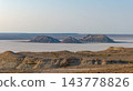 The distant Karinjalik plateau bathed in the soft evening light 143778826