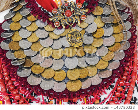 Traditional ornament of Ukrainian women is a dukach or ducat, yahnus Traditional ornament of Ukrainian women is a dukach or ducat, yahnus 143780328