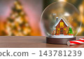 Magical Christmas Snow Globe with Cozy Winter House and Festive Decorations 3d render. 143781239