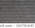 A gray, textured border. A background texture with coarse horizontal stripes. 143781645