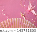 A fan and a pink background 143781803
