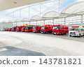 Fire trucks and ambulances waiting at the fire station 143781821