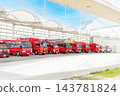 Fire trucks and ambulances waiting at the fire station 143781824