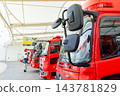 Fire trucks waiting at the fire station 143781829