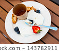 Mato cheese served with honey and berries 143782911