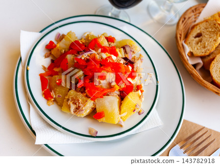 Potato salad with egg, canned tuna, onions, baked peppers and olives 143782918