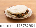 Taiwanese braised pork burger, gua bao (Chinese steamed bun) 143782984