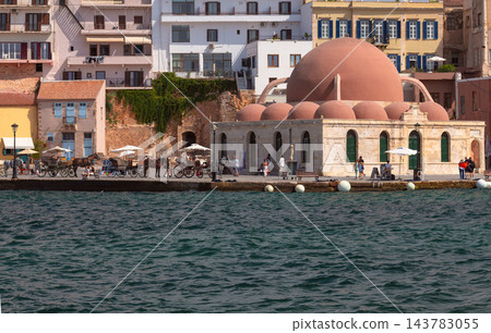 Kucuk Hasan Mosque and Horse Carriages at Chania Venetian Harbor, Crete, Greece Kucuk Hasan Mosque and Horse Carriages at Chania Venetian Harbor, Crete, Greece 143783055