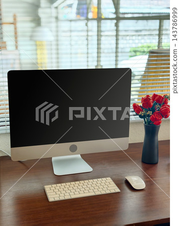 Minimalist Modern Desktop Computer Workspace with Black Screen Mockup and Red Roses 143786999