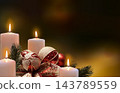Festive Chrismas background with burning candles and ornaments 143789559