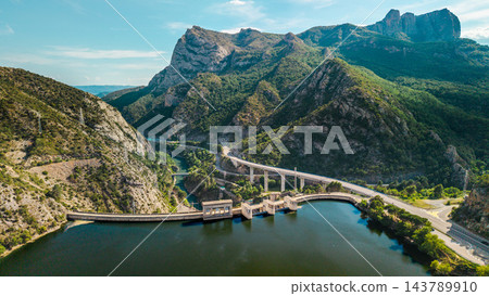 Aerial Oliana Dam, Reservoir and Hydroelectric Station in Catalonia's Pyrenees Aerial Oliana Dam, Reservoir and Hydroelectric Station in Catalonia's Pyrenees 143789910