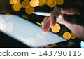 Man Working On A Project On The Tablet With His New Stylus And Tablet  143790115