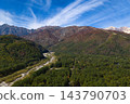 Autumn foliage in Hirakawa-Gentaro and the Hakuba mountain range, Hakuba Village, Nagano Prefecture (aerial photography by drone) 143790703