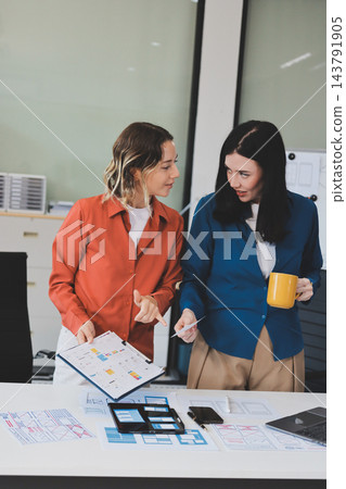 team of UI UX web designer are working together to develop mobile responsive websites with UI UX front end designer previews team of UI UX web designer are working together to develop mobile responsive websites with UI UX front end designer previews 143791905